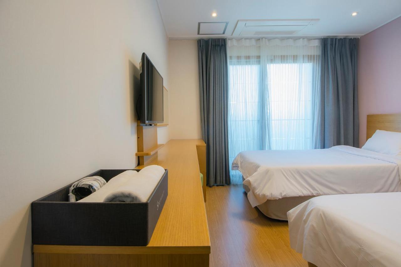 Sims Hotel Jeju Extérieur photo
