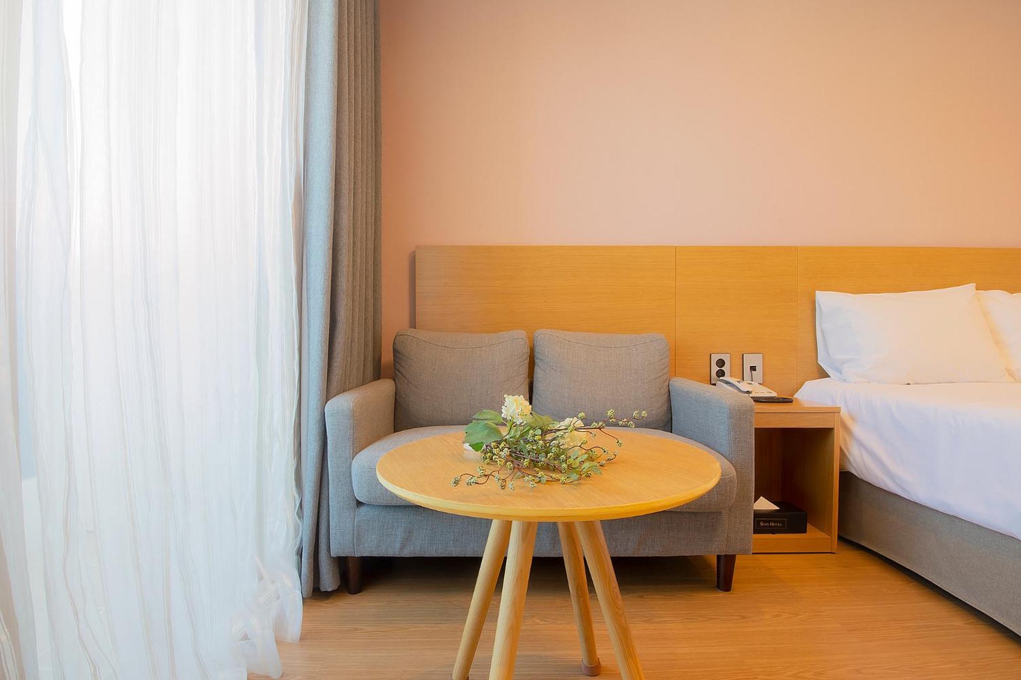 Sims Hotel Jeju Extérieur photo